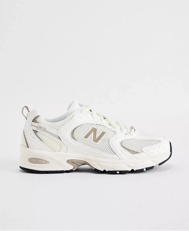 New Balance 530 Sneaker White Beige side view featuring a clean and comfortable design.
