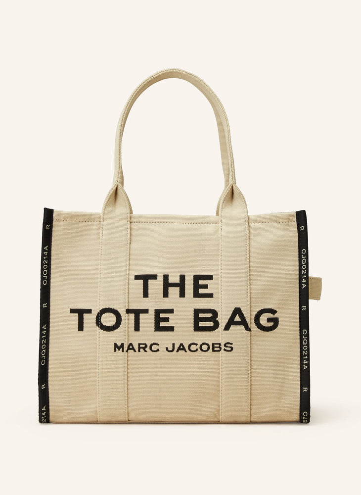 Marc Jacob Canvas Shopper Tote Bag with large black text on a beige canvas background.