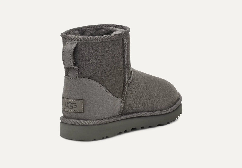 Gray UGG boot on a white background