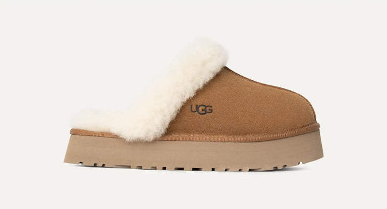 Brown slipper with white fur lining . UGG Womens Disquette Cozy and Stylish Slippers