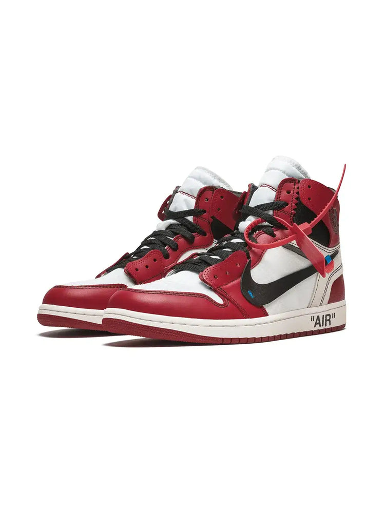 Air Jordan Off White 1 Chicago Sneakers featuring a bold red and white design with signature branding.