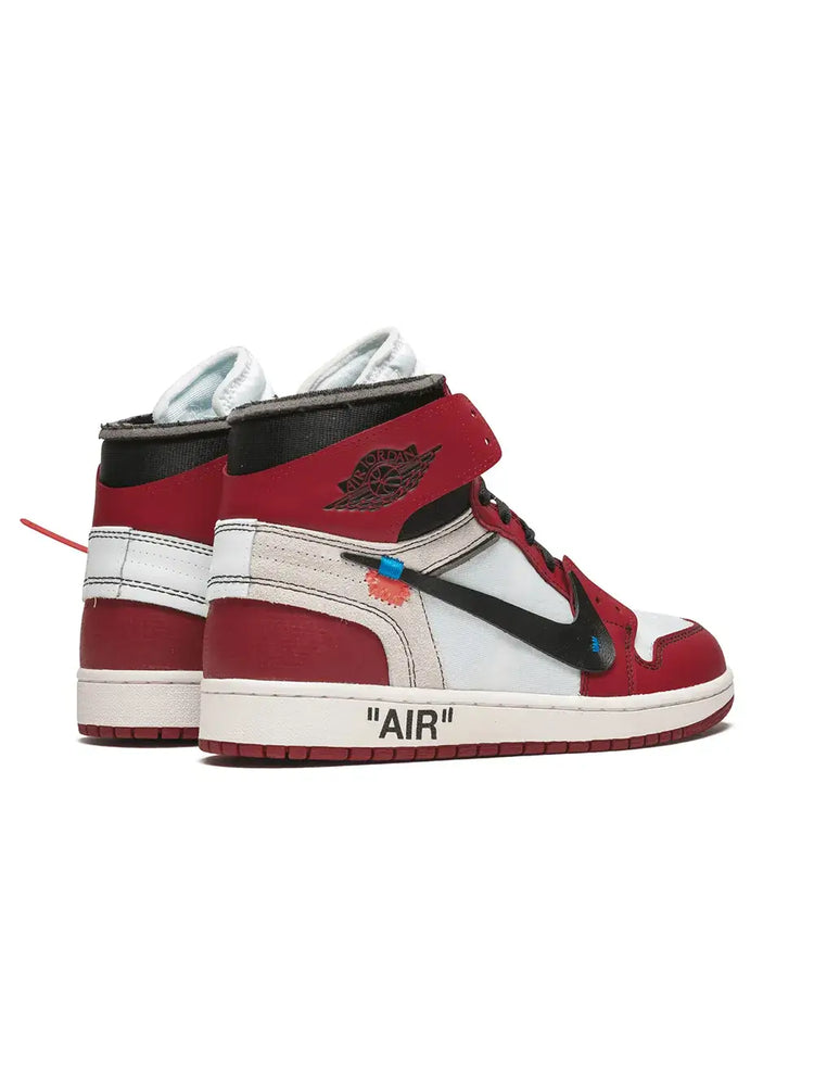 Air Jordan Off White 1 Chicago Sneakers featuring a bold red and white design with signature branding.