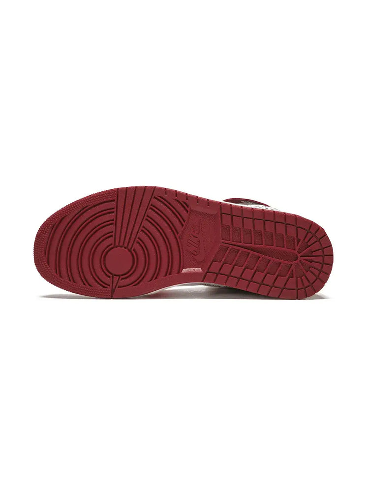 Air Jordan Off White 1 Chicago Sneakers featuring a bold red and white design with signature branding.