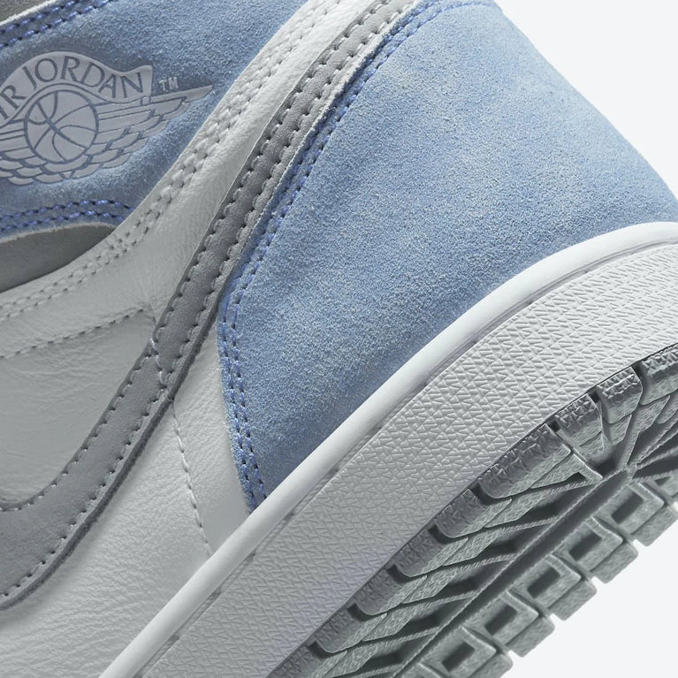 Nike Jordan 1 High OG Hyper Royal side view showcasing iconic design and blue hues. Nike Jordan 1 High OG Hyper Royal side view showcasing iconic design and blue hues at Volonka