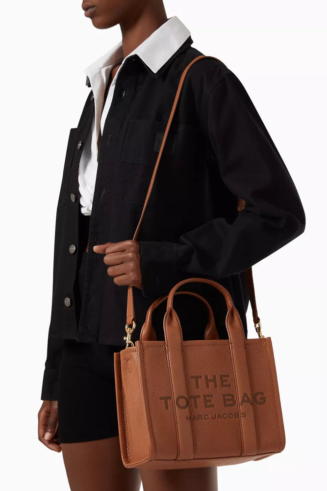 Marc Jacobs Shopper Tote Bag Leather Brown in a stylish brown color with top handles and logo at Volonka.