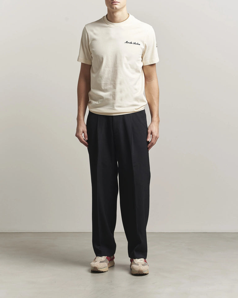Moncler Men Signature Logo Tshirt displayed in Off white, featuring logo detail and contrasting neckline.