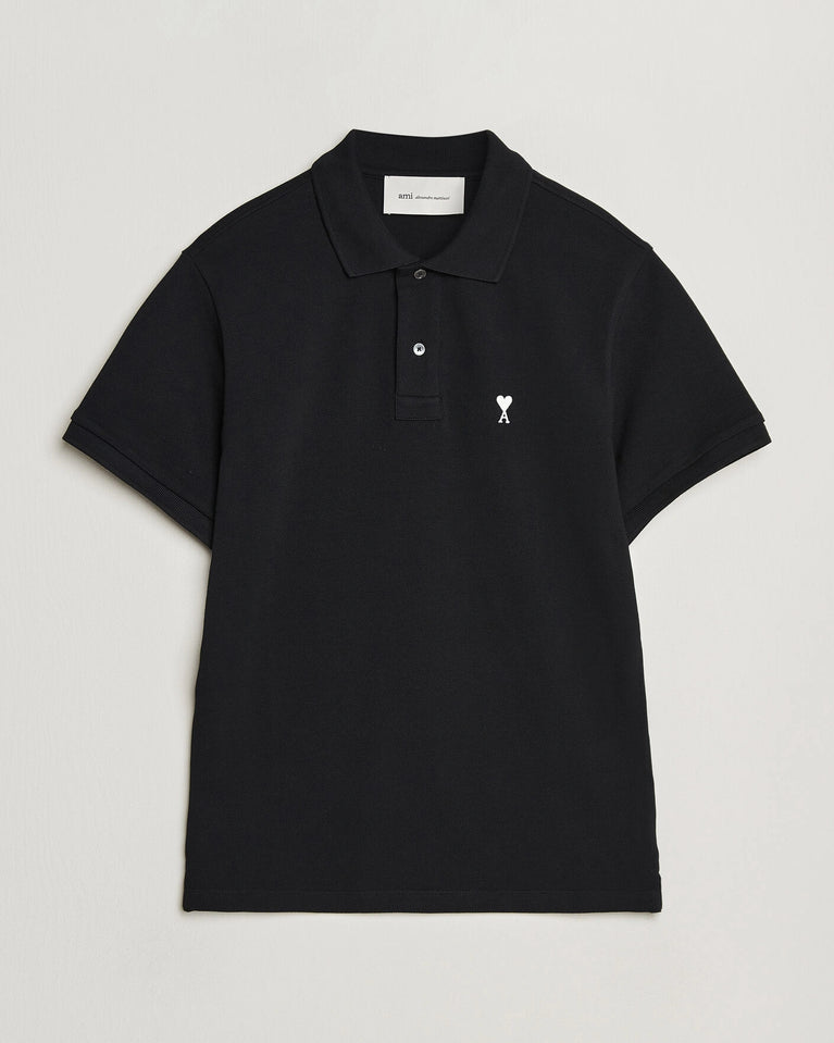 AMI Paris Heart Logo Men Polo Shirt in black, featuring a heart logo, classic and modern style.