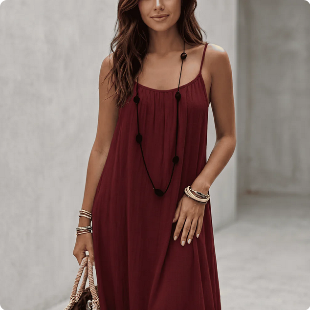 Woman wearing a Backless Loose Home Long Dress in burgandy, showcasing a relaxed and stylish look.