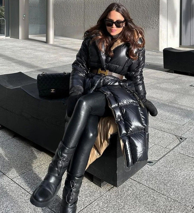 Woman in Moncler Cavettaz Hooded Long Down Jacket at volonka.