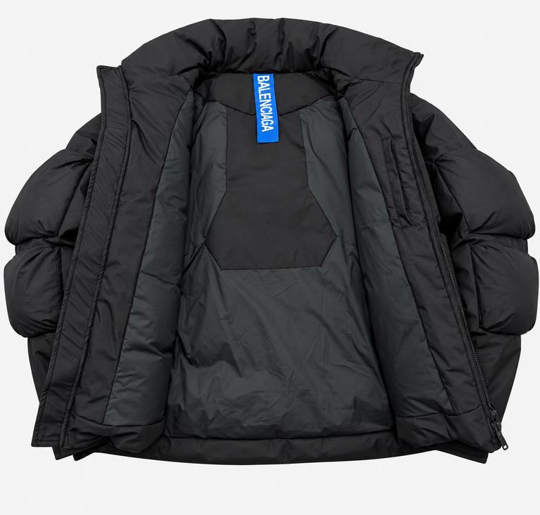 Balenciaga Oversize Puffer Jacket in black with voluminous puffed sleeves and stylish detailing.