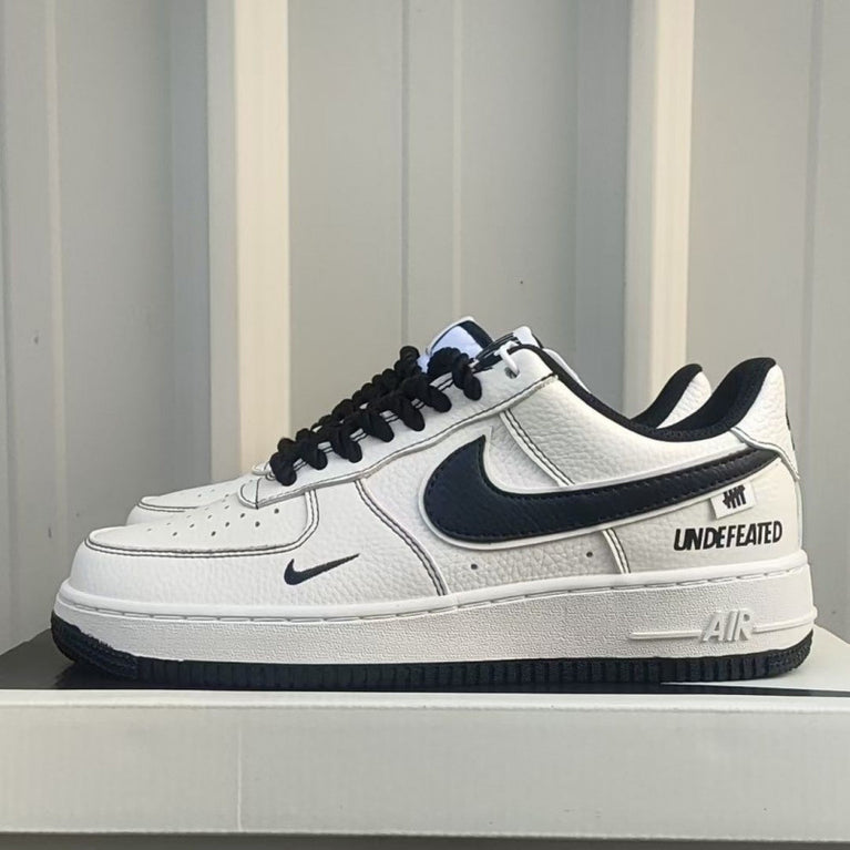 White sneaker with black accents. Nike Unisex F1 Air Force paris Low-top Casual Shoes