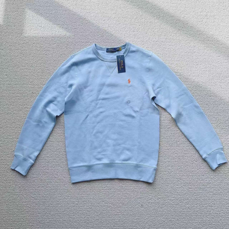Light blue Polo Ralph Lauren crew neck sweatshirt laid flat on white background