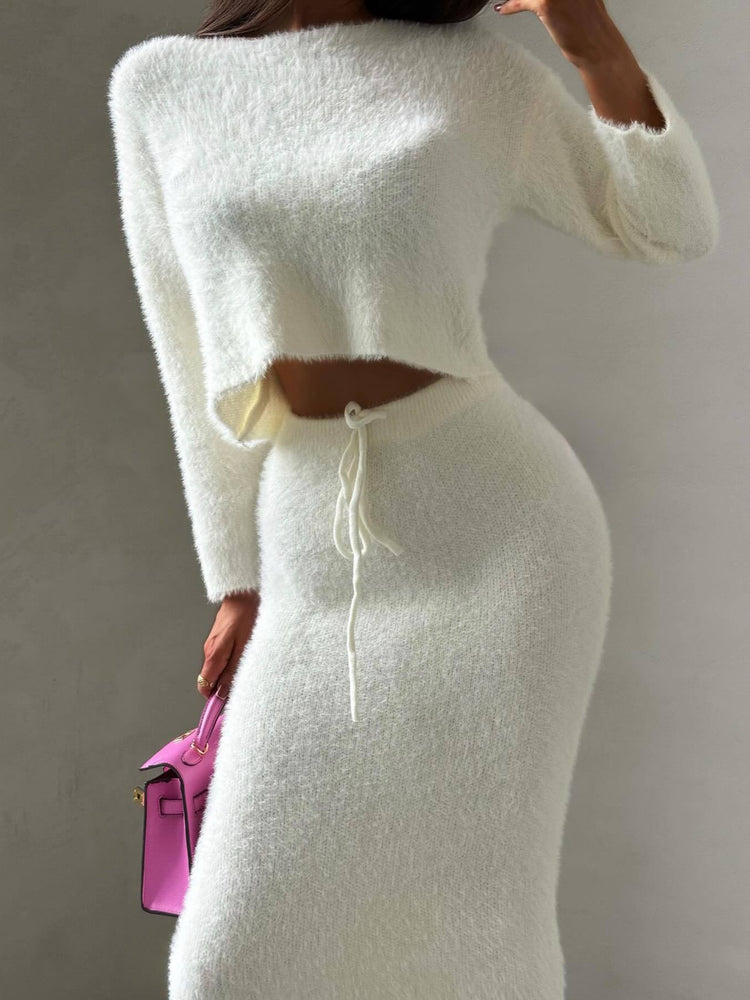 White textured dress with cut-out design and pink bag, Luxury Fuzzy Knit Two Piece Skirt Set Chic Celebrity Style at Volonka.