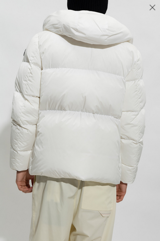 White puffer jacket worn by a person on a white background. Moncler Montcla Short Down Jacket