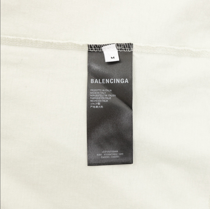 Balenciaga Oversize Washed Ripped Tshirt in white.