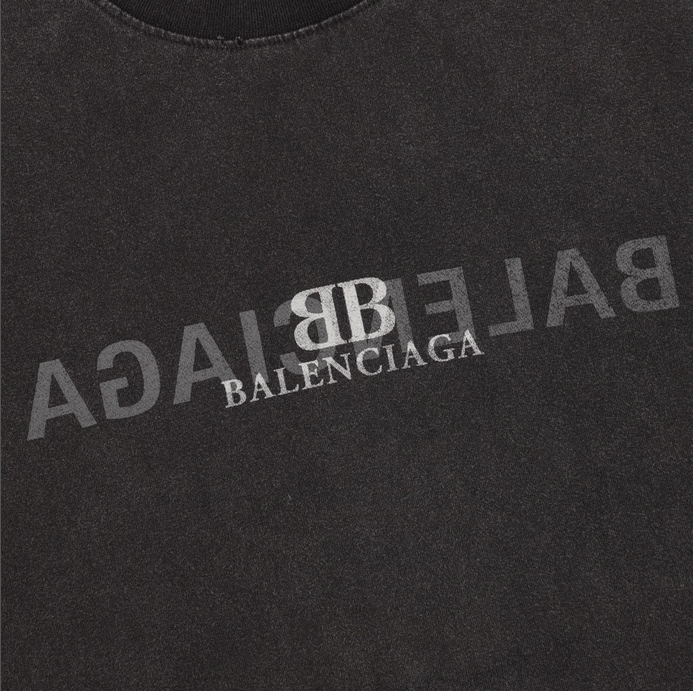 Balenciaga Oversize Washed Ripped Tshirt in black.