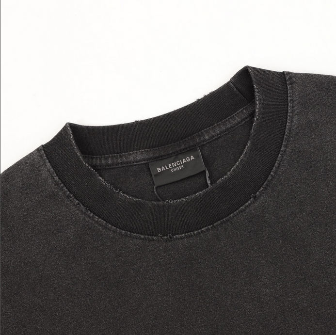 Balenciaga Oversize Washed Ripped Tshirt in black.