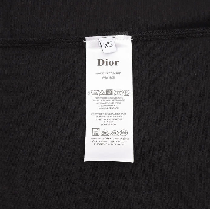 Dior Essential unisex Pocket Tshirt displayed on a hanger, showcasing its stylish black design.