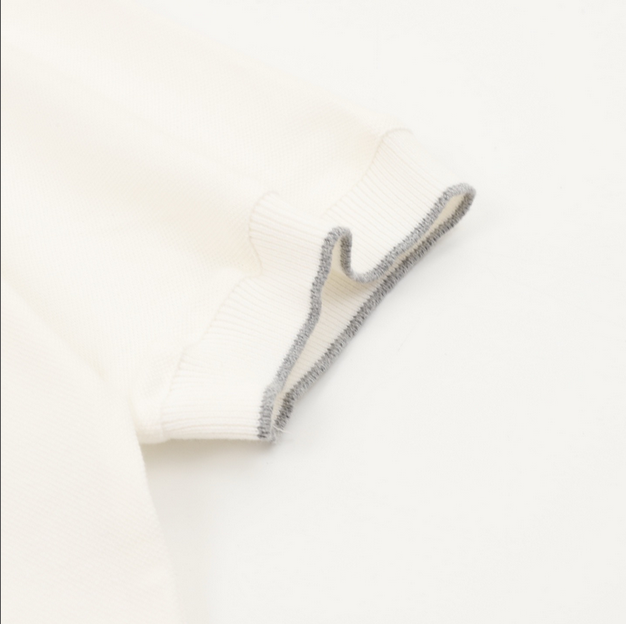 Brunello Cucinelli Men Polo Shirt displayed on a hanger in white color.