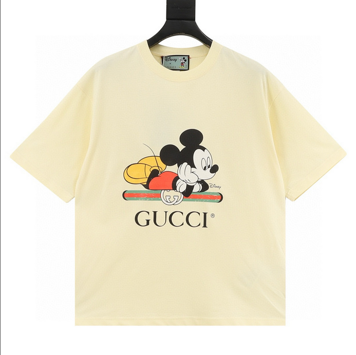 Gucci Disney Micky Mouse Milky Tshirt featuring Mickey Mouse design on a soft yellow oversized T-shirt.
