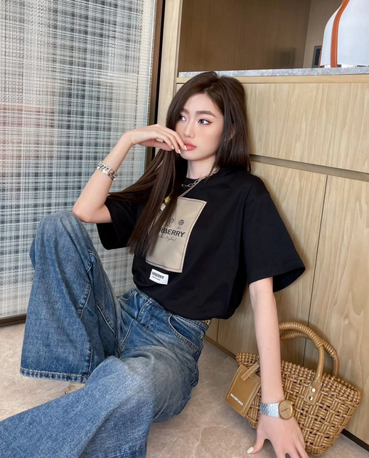 Burberry Cotton Label Oversize Tshirt displayed with a classic black design and prominent logo.