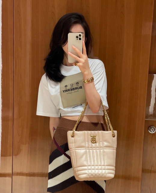 Burberry Cotton Label Oversize Tshirt displayed with a classic white design and prominent logo.