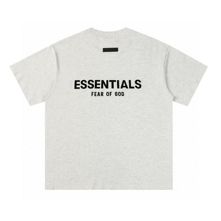FEAR OF GOD ESSENTIALS Tshirt with Logo in gray color featuring minimalist design and modern styling.