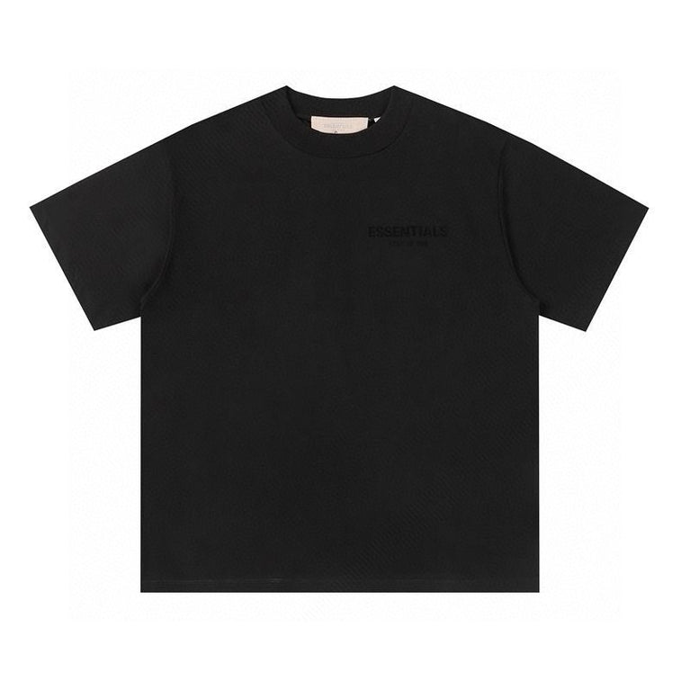 FEAR OF GOD ESSENTIALS Tshirt with Logo in black color featuring minimalist design and modern styling.