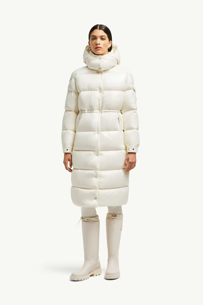 Woman wearing a long white puffer coat, Moncler Cavettaz Hooded Long Down Jacket at volonka