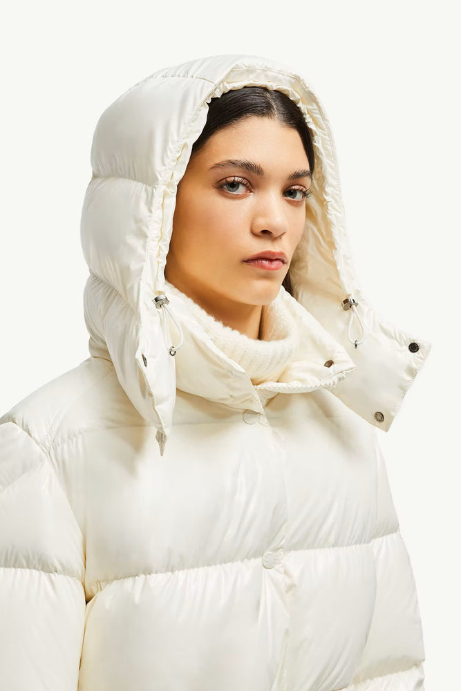 Woman wearing a Moncler Cavettaz Hooded Long Down Jacket at volonka