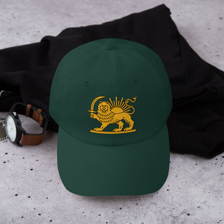 Shiro Khorshid-Lion Sun Persian Hat featuring a lion emblem on a Green cap.