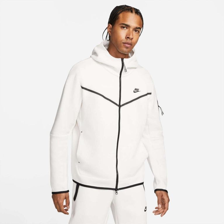 Nike Sportswear Tech Fleece Hoodie & Joggers Set White model wearing hoodie and joggers, showcasing modern sportswear design.