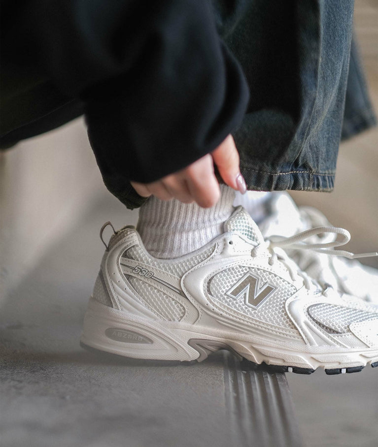 New Balance 530 Sneaker White Beige side view featuring a clean and comfortable design.