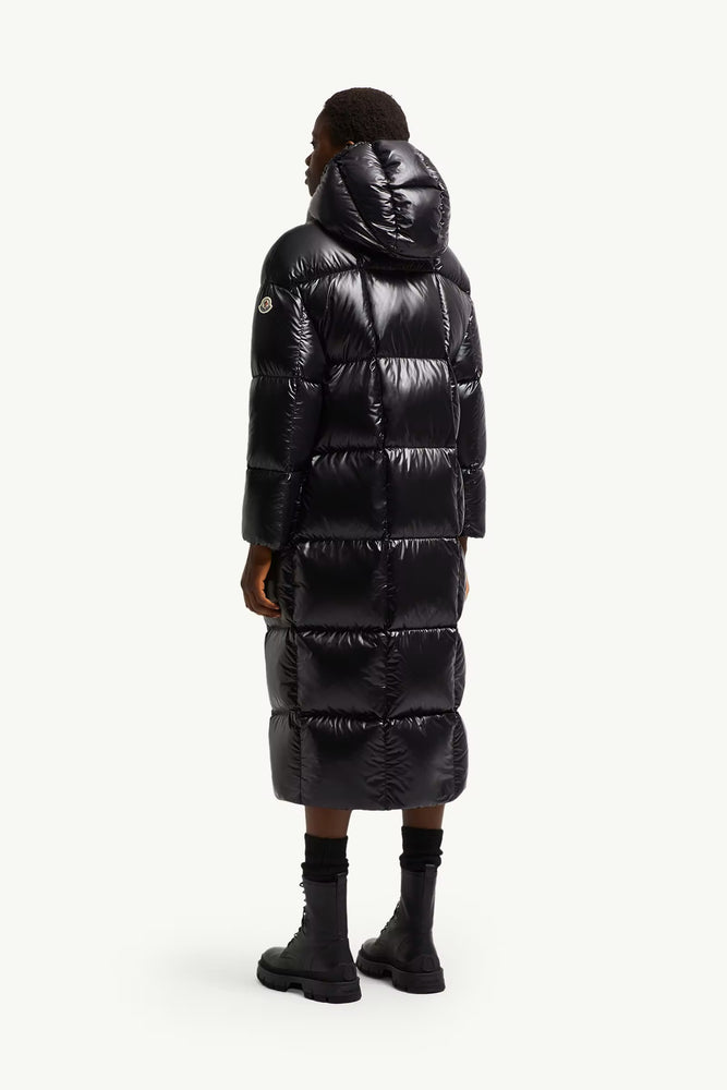 Person wearing a black puffer coat, Moncler Cavettaz Hooded Long Down Jacket