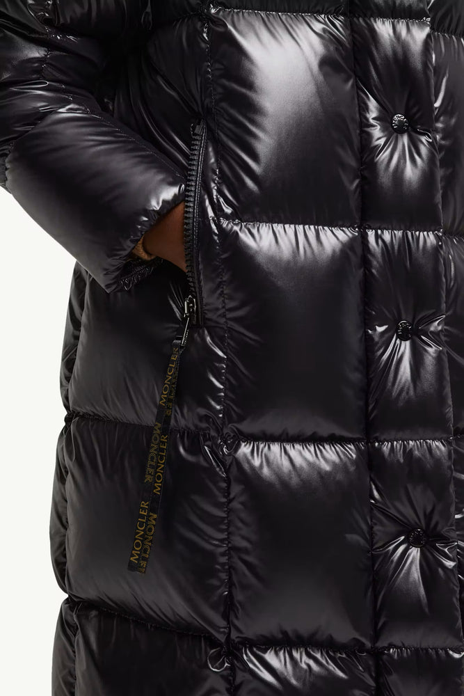 Close-up of a black puffer jacket with a brand logo, Moncler Cavettaz Hooded Long Down Jacket