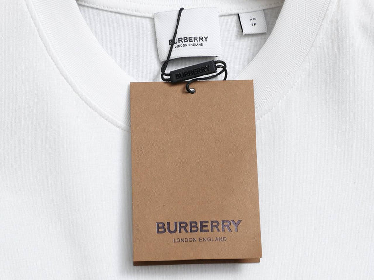 Burberry Cotton Label Oversize Tshirt displayed with a classic white design and prominent logo.