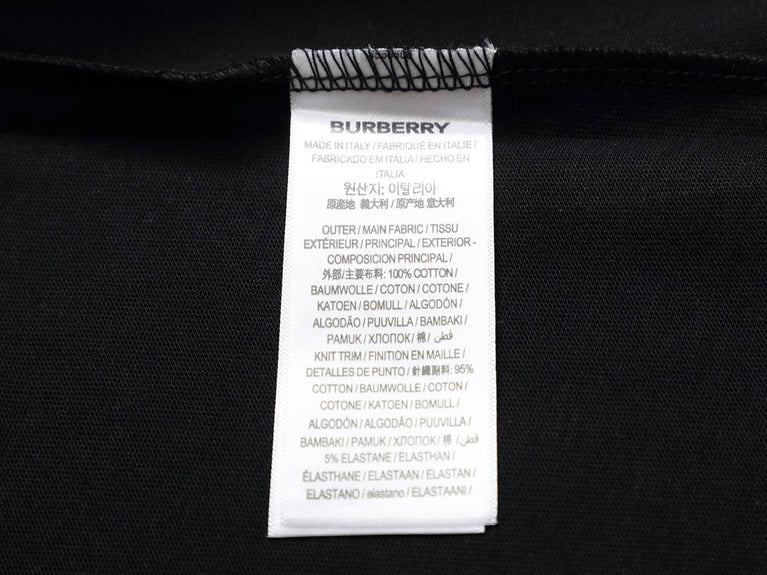 Burberry Cotton Label Oversize Tshirt displayed on a hanger with a classic black design and prominent logo.