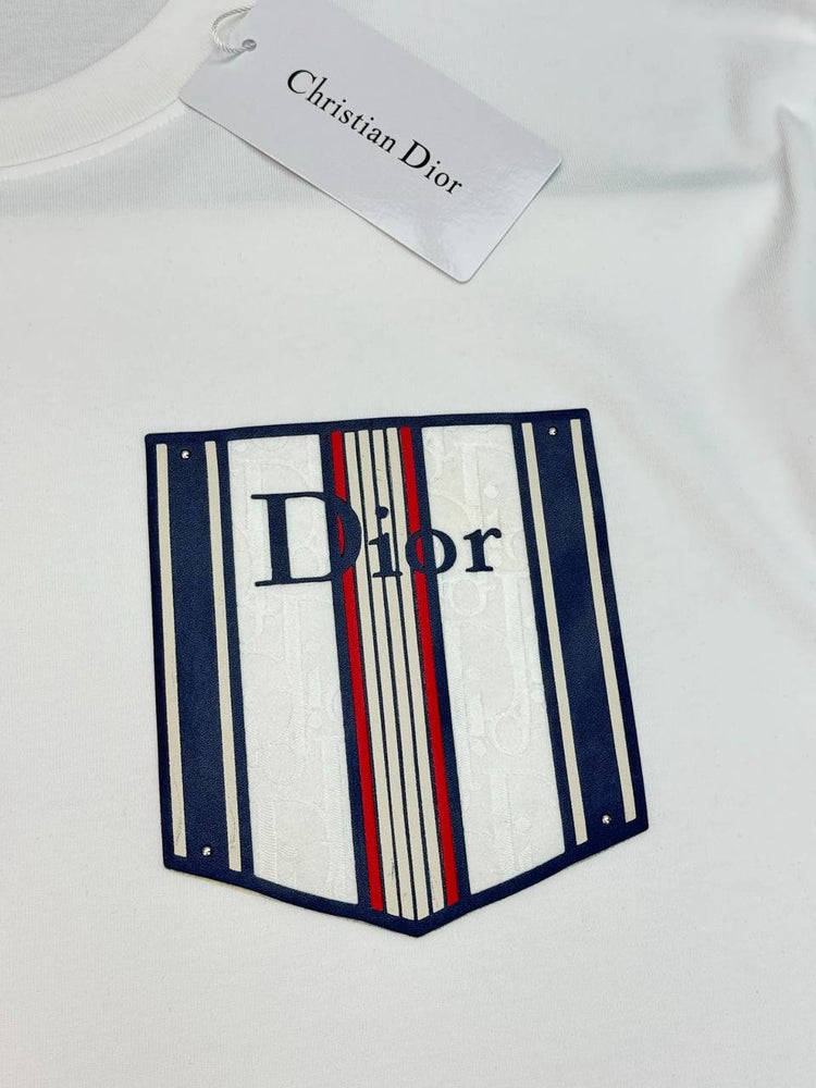 Dior Essential unisex Pocket Tshirt displayed on a hanger, showcasing its stylish white design.