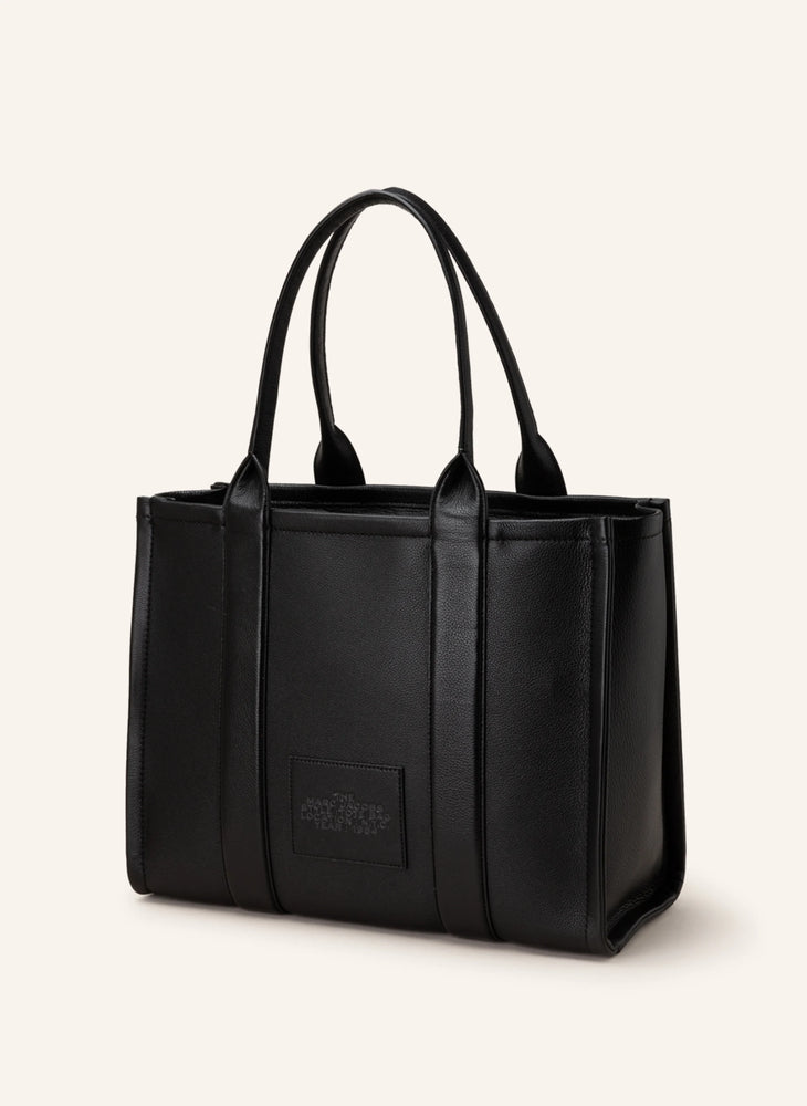 Marc Jacobs Shopper Tote Bag Leather Black on a light background, showcasing its elegant design and sleek silhouette.