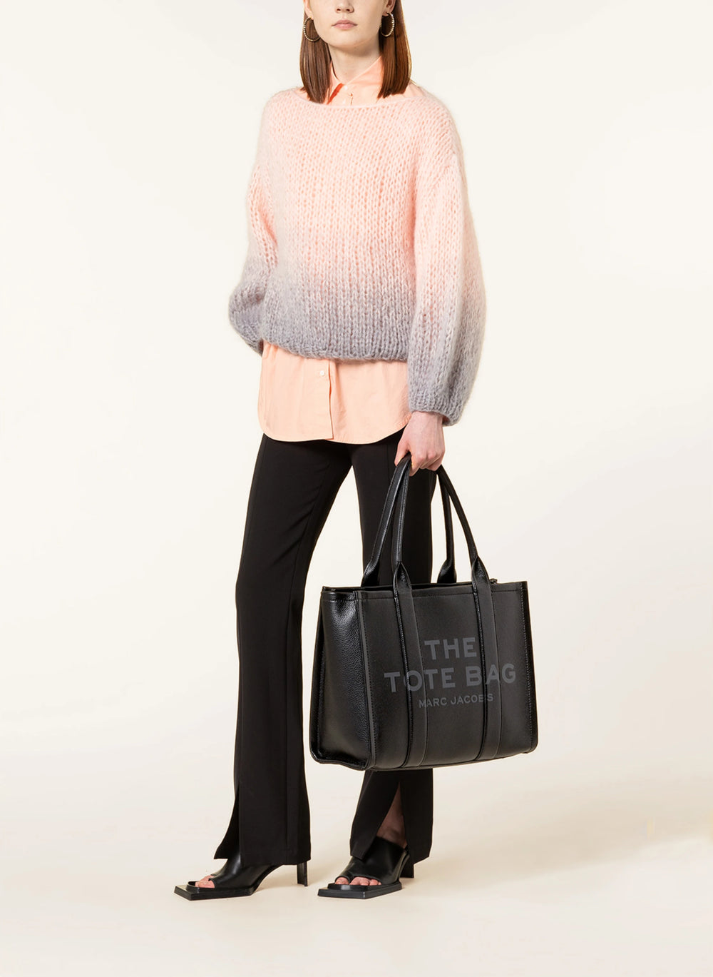 Marc Jacobs Shopper Tote Bag Leather Black on a light background, showcasing its elegant design and sleek silhouette.
