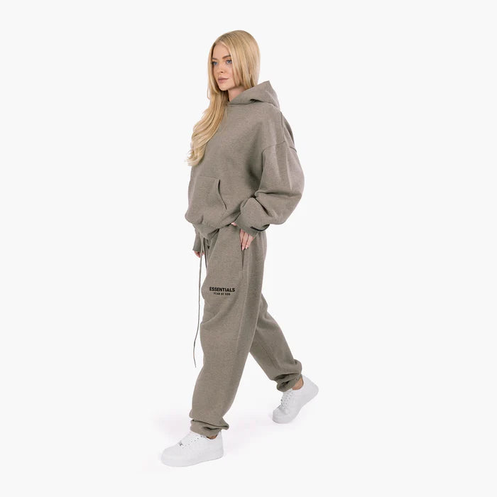 FEAR OF GOD ESSENTIALS Sweatpant in Brown, featuring a comfortable fit and minimalist design for stylish loungewear. 