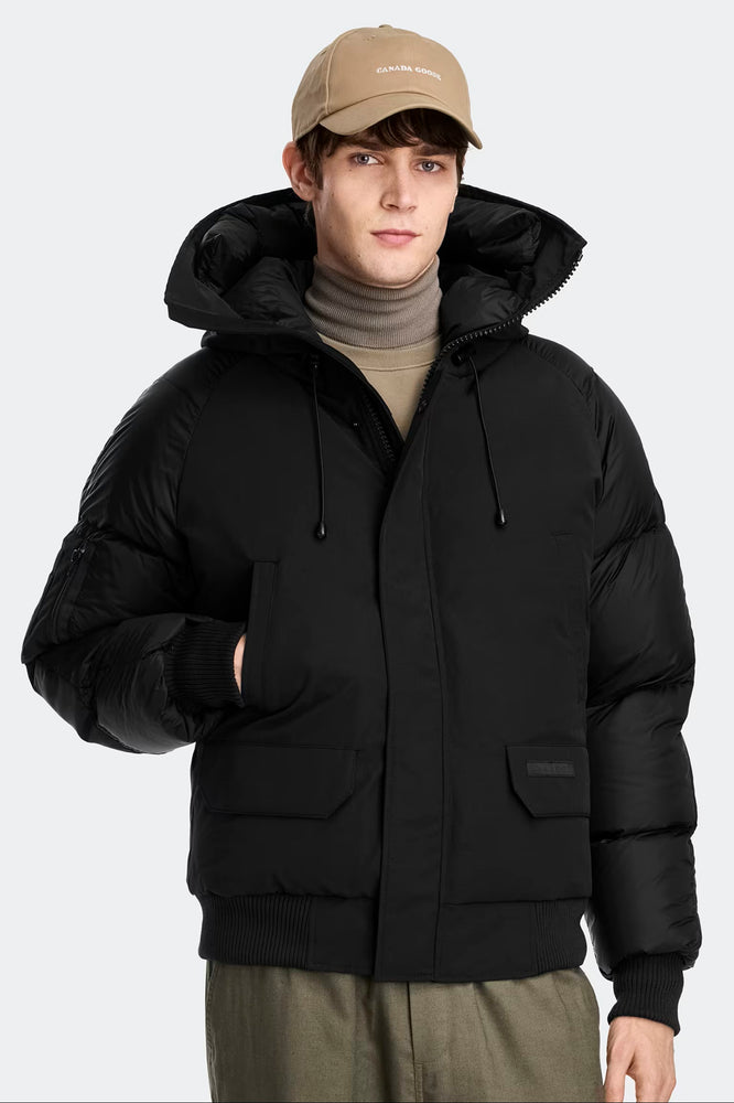 Man wearing Canada Goose Paradigm Chilliwack Bomber Unisex Down Jacket at Volonka store.
