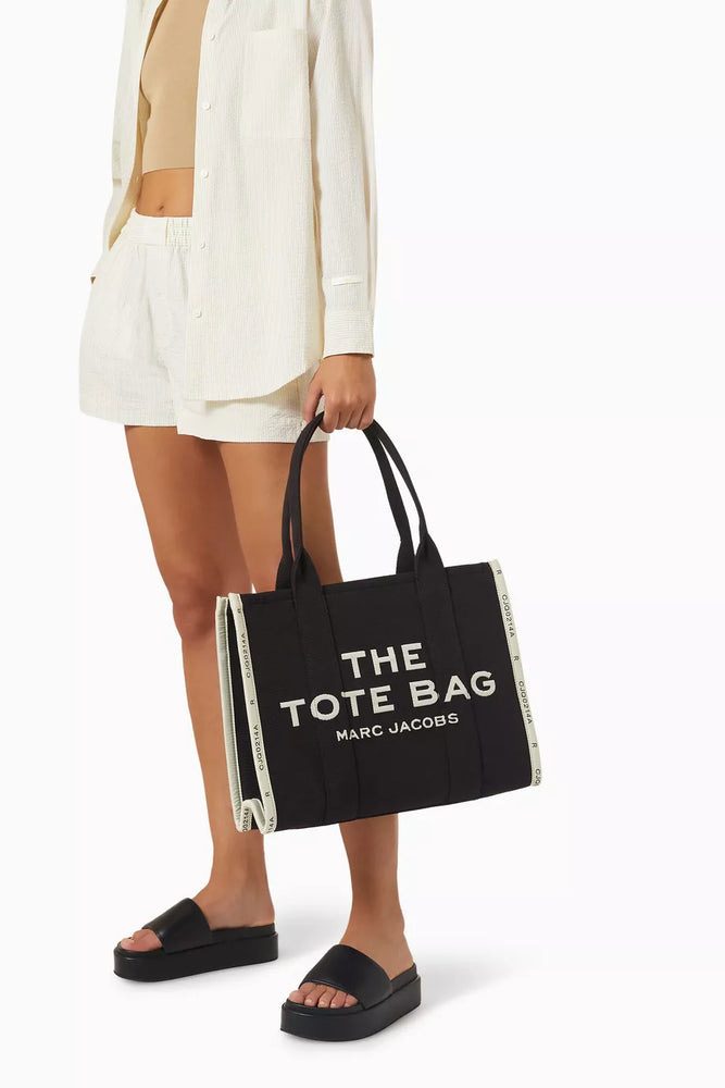 Marc Jacob Canvas Shopper Tote Bag in black with bold white lettering, stylish and practical for everyday use.