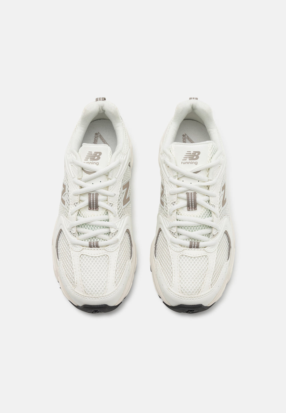 New Balance 530 Sneaker White Beige side view featuring a clean and comfortable design.