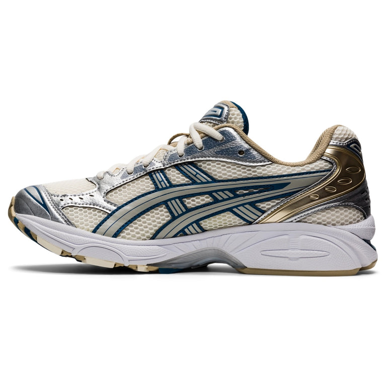Asics Gel Kayano 14 Unisex Cream Pure Silver running shoes with silver and cream color scheme.
