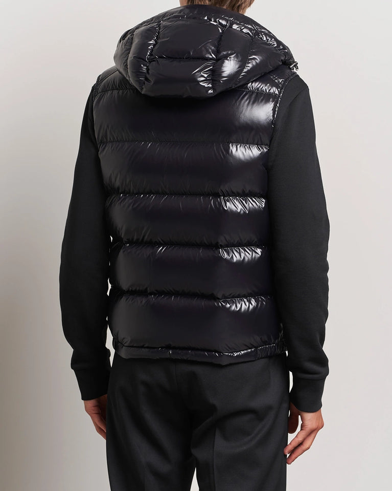 Women/ men Black puffer vest worn by a person. Moncler unisex Bormes down vest jacket