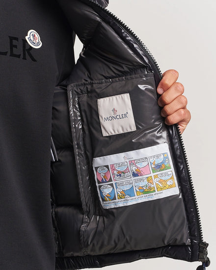 Moncler unisex Bormes down vest jacket. black Moncler jacket with a visible brand label.