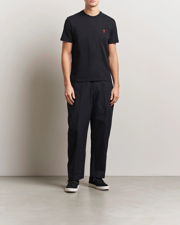 AMI Paris Heart Logo Men Tshirt in black with red heart logo design.