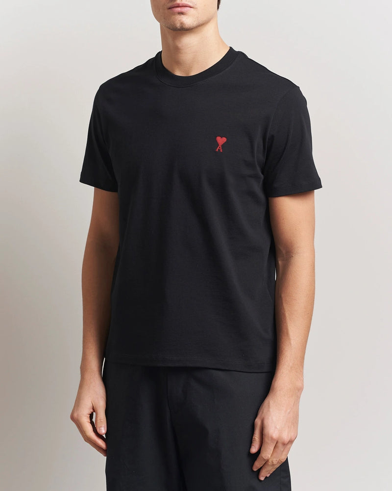 AMI Paris Heart Logo Men Tshirt in black with red heart logo design.