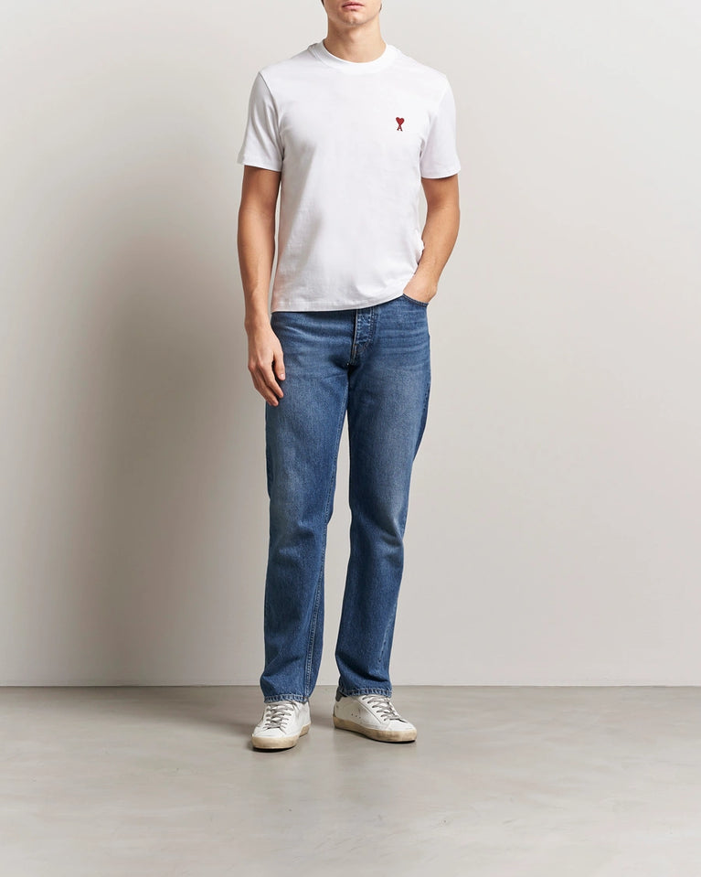 AMI Paris Heart Logo Men Tshirt featuring a white color and a red heart logo on the chest.